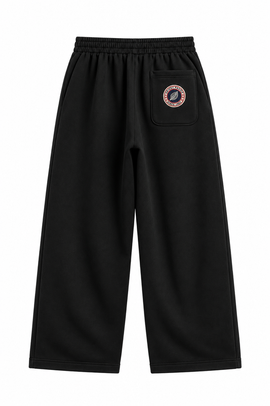 Jogging Sweet Pants Iconic Baggy 26 noir de dos avec poche plaquée et patch logo tricolore